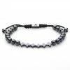 Arkai Sanatio | Grey Hematite and Stainless Steel Cross Bracelet
